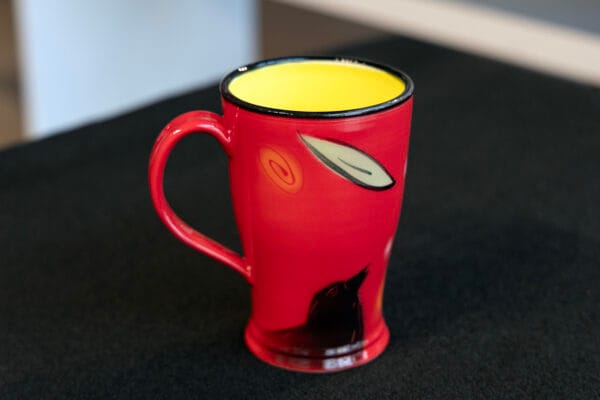 red raven ceramic cup by Natalie Warrens